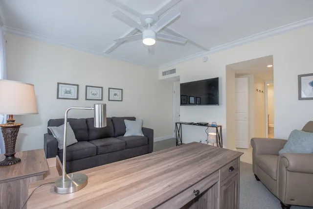 a kitchen with stainless steel appliances granite countertop a sink and a stove