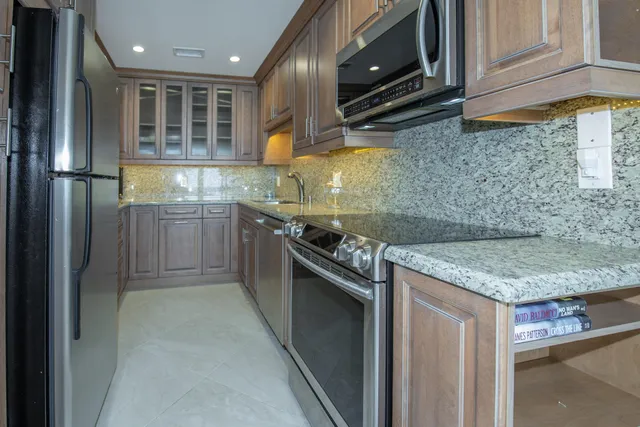 a view of beach and kitchen