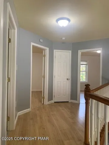 a bathroom with a sink toilet and mirror