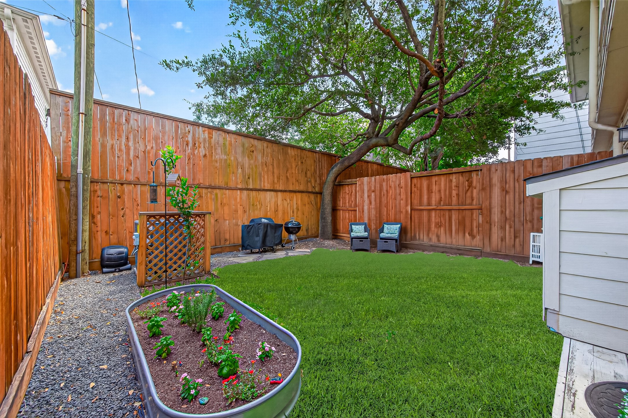 5011 Inker Street Houston, TX 77007 - Photo 2 of 23 Private Backyard with landscaping and garden.