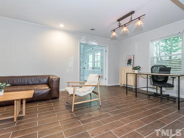 a workspace with furniture and a window