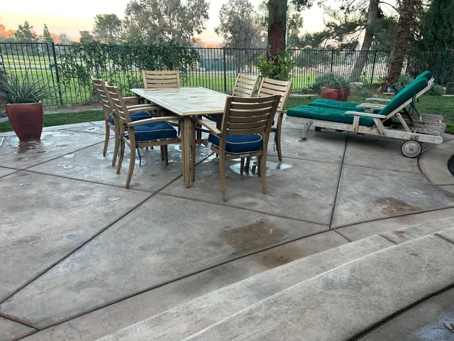 a view of a tables and chairs in the patio