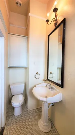 a white bath tub sitting in a bathroom
