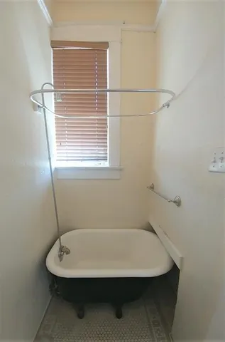 a view of street with parked cars