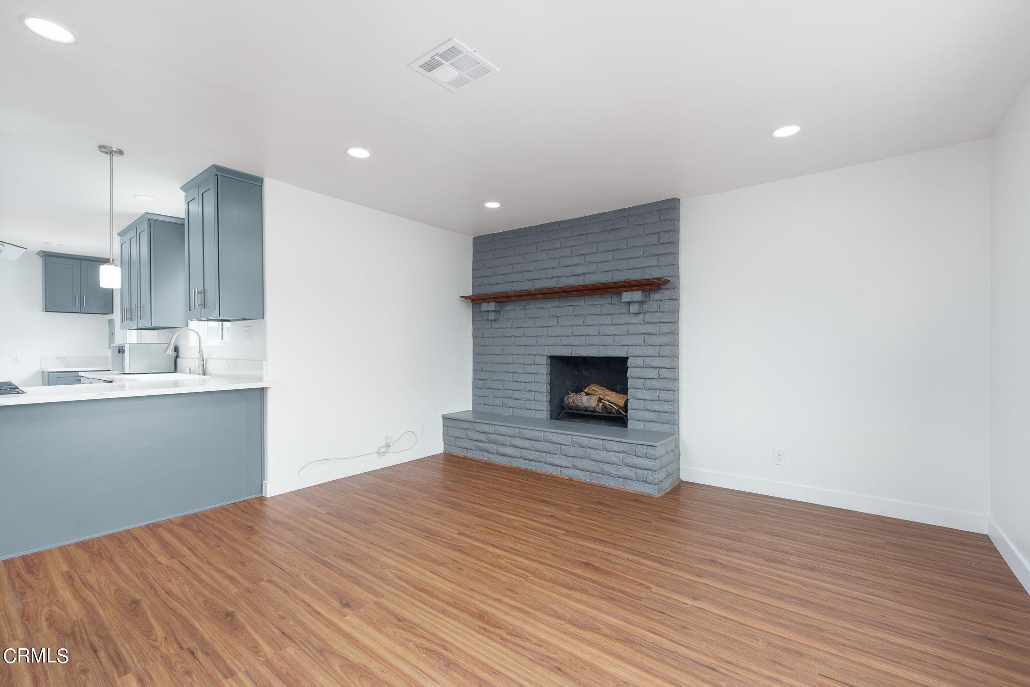 20205 Schoolcraft Street Winnetka, CA 91306 - Photo 13 of 22 a view of kitchen with sink and microwave