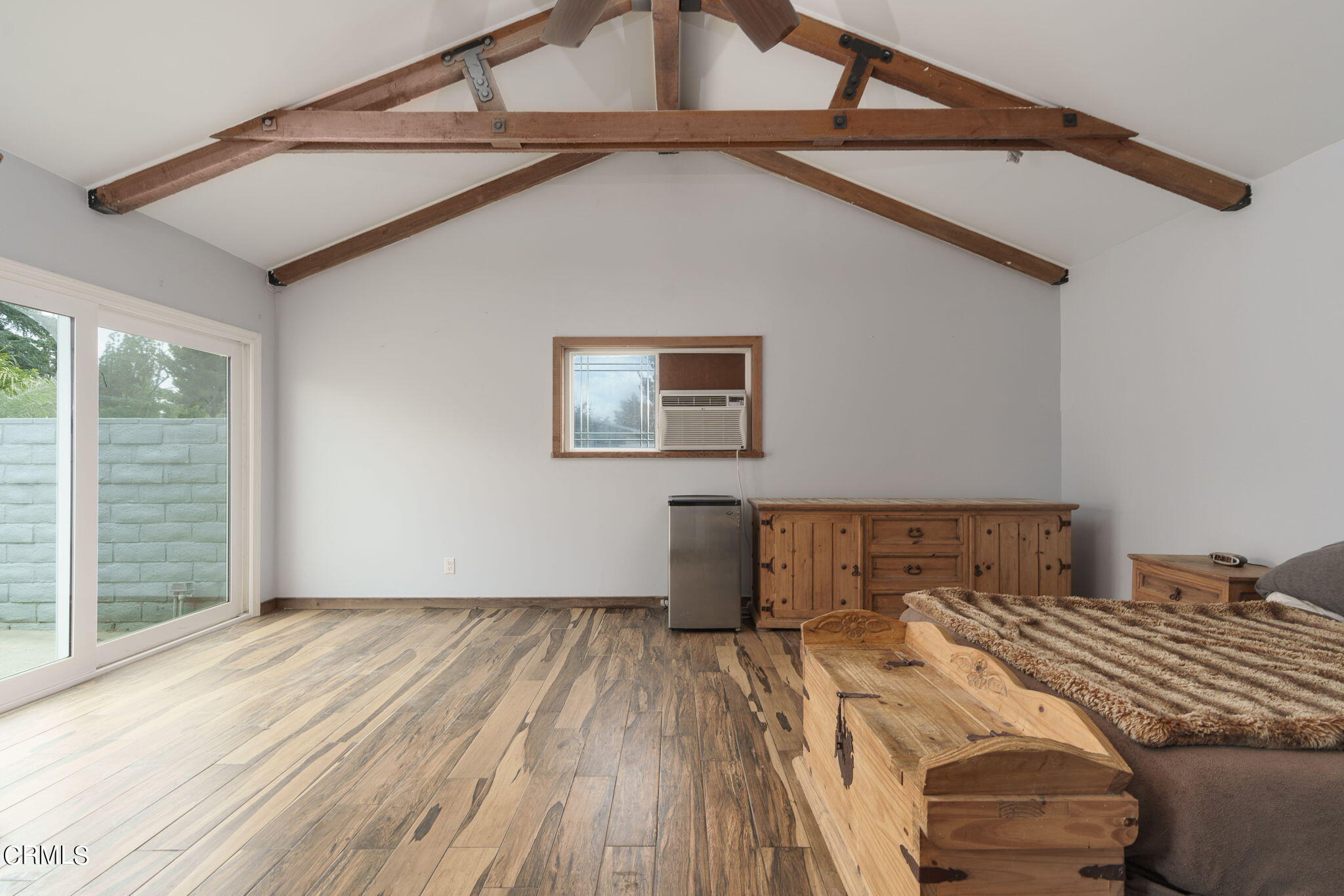 20205 Schoolcraft Street Winnetka, CA 91306 - Photo 18 of 22 a bedroom with a bed and a window