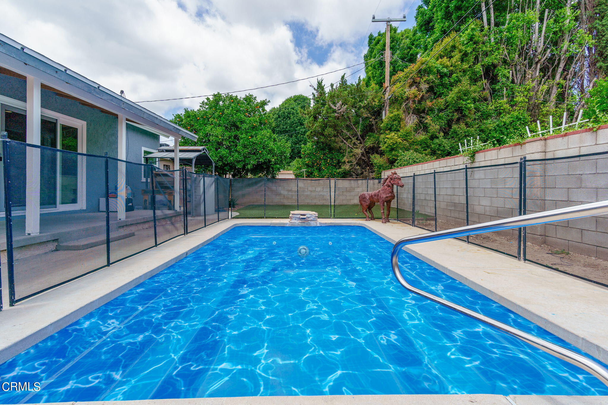 20205 Schoolcraft Street Winnetka, CA 91306 - Photo 21 of 22 a view of a backyard