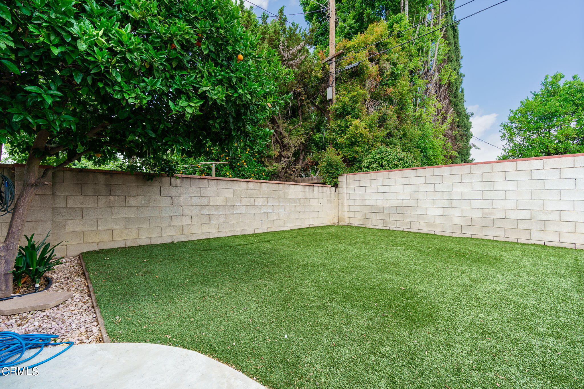 20205 Schoolcraft Street Winnetka, CA 91306 - Photo 22 of 22 a view of yard with green space