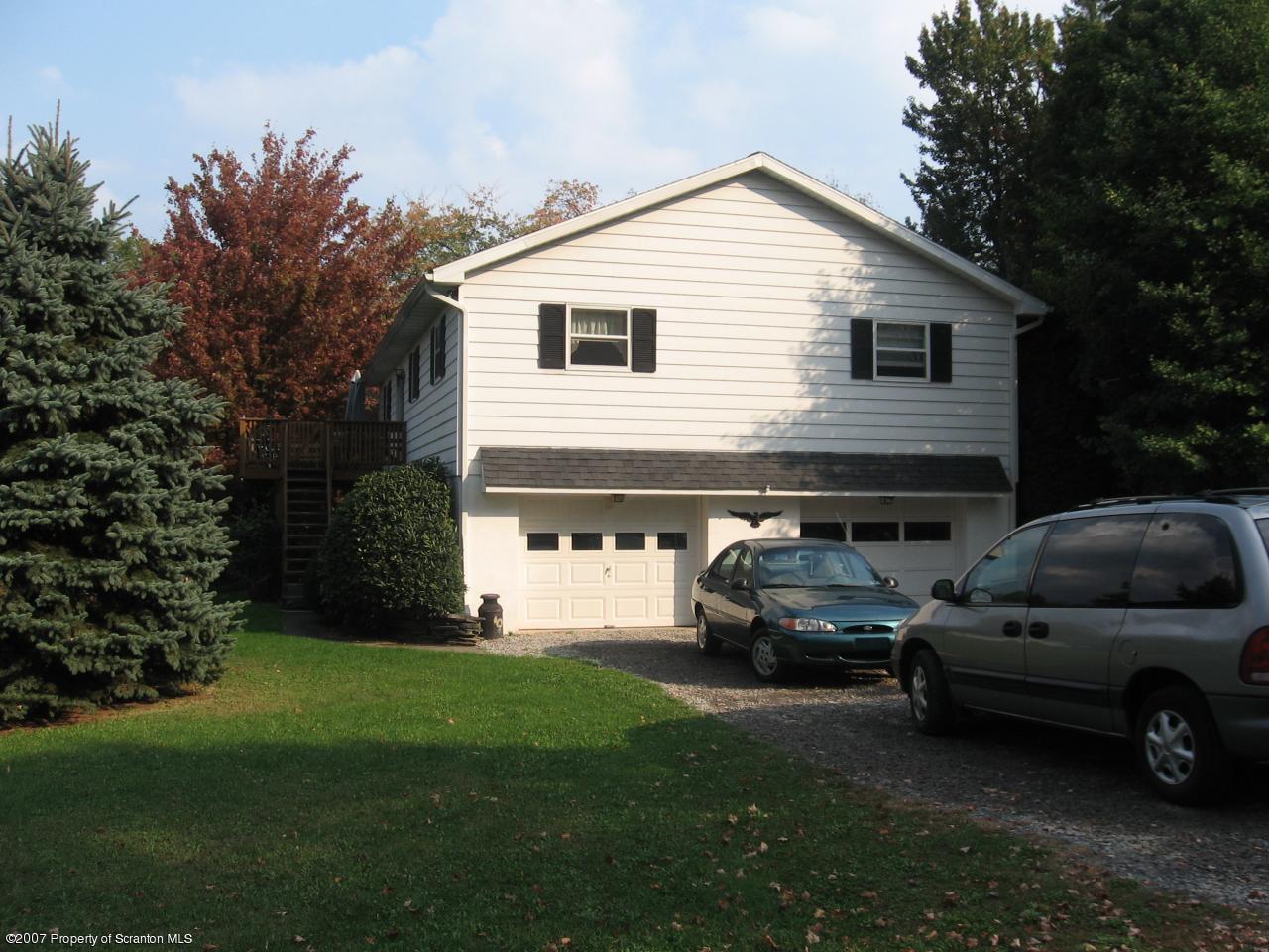343 Fox And Hound Road Moscow, PA 18444 - Photo 4 of 4 a view of a car parked in front of a house