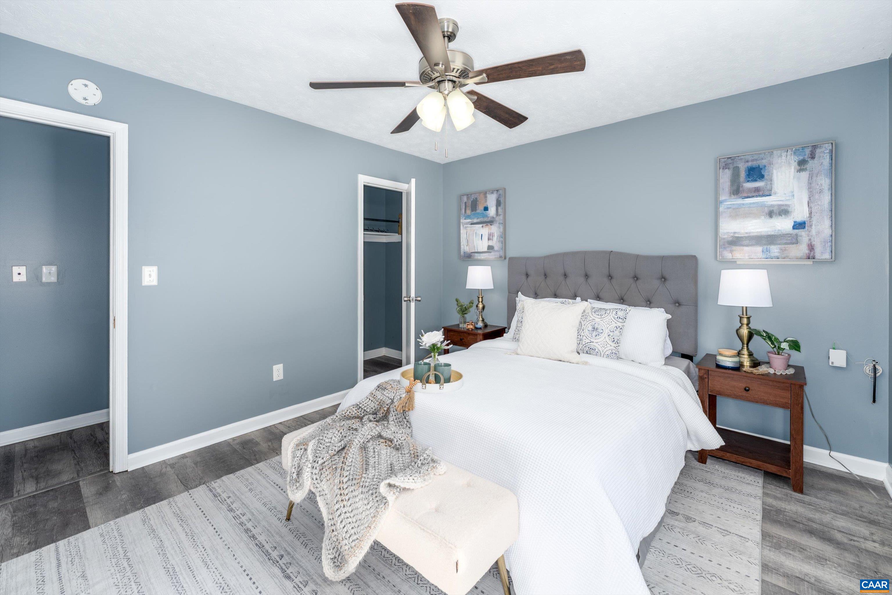 1424 B Street Waynesboro, VA 22980 - Photo 16 of 32 a bedroom with bed and a chandelier