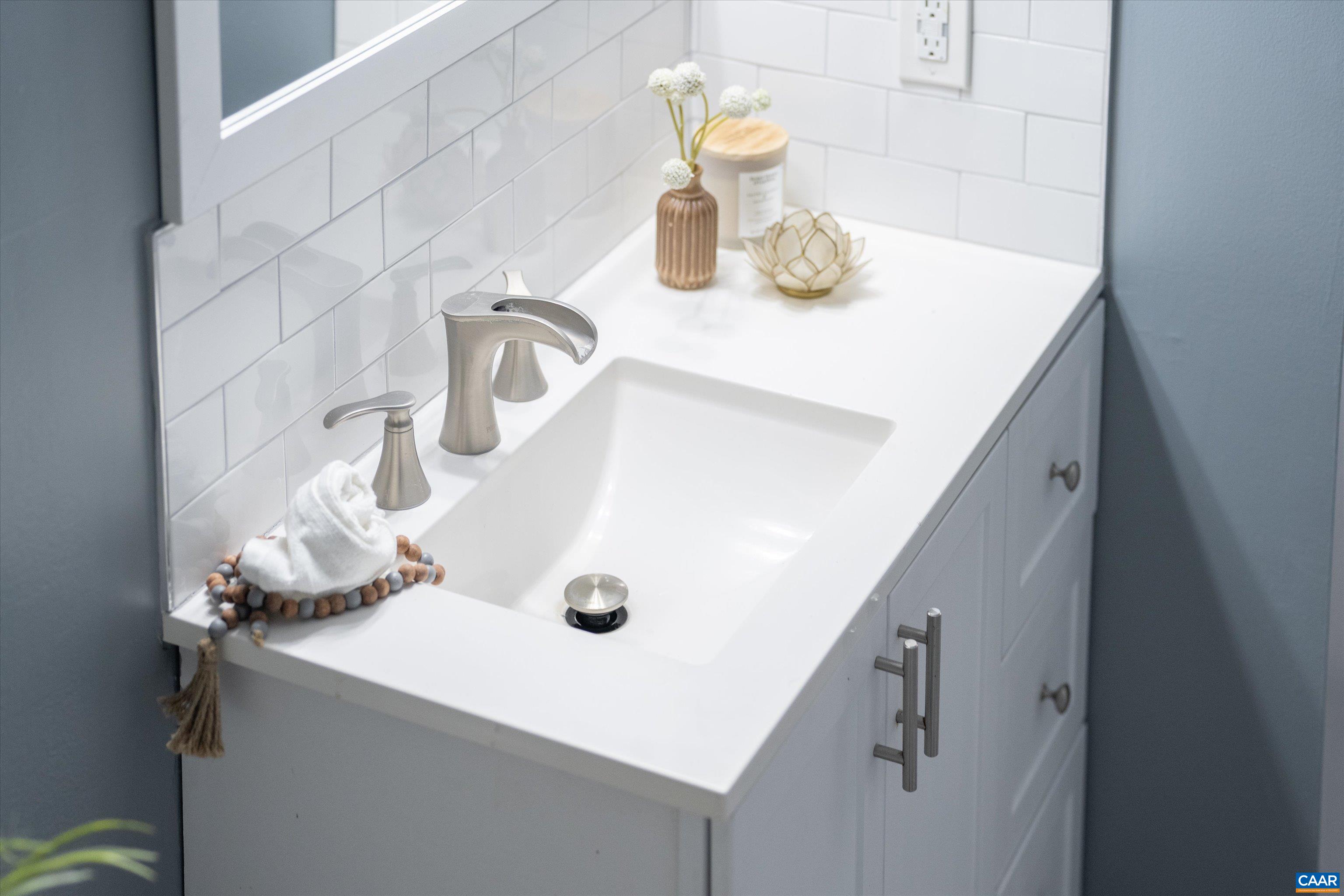 1424 B Street Waynesboro, VA 22980 - Photo 17 of 32 a bathroom with a sink and a mirror