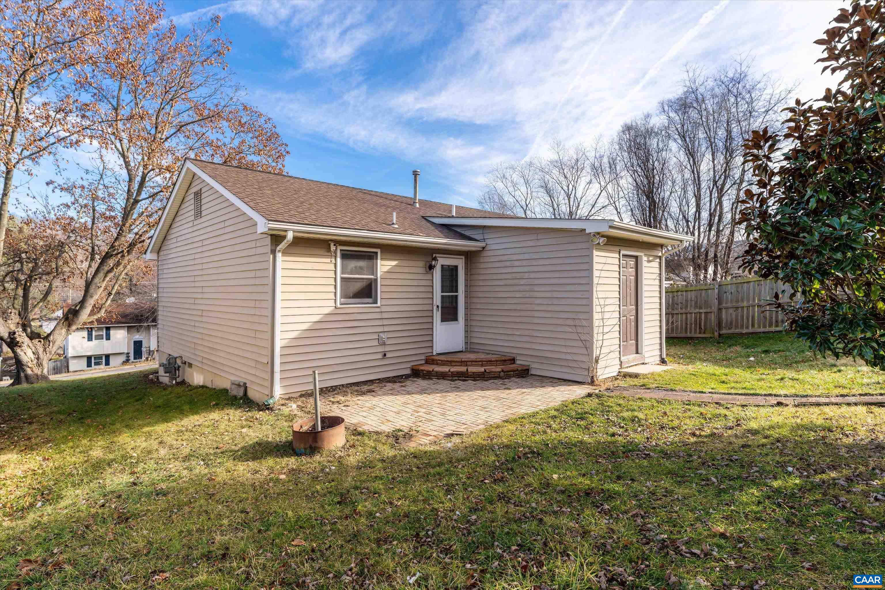 1424 B Street Waynesboro, VA 22980 - Photo 23 of 32 a view of a backyard with a large tree