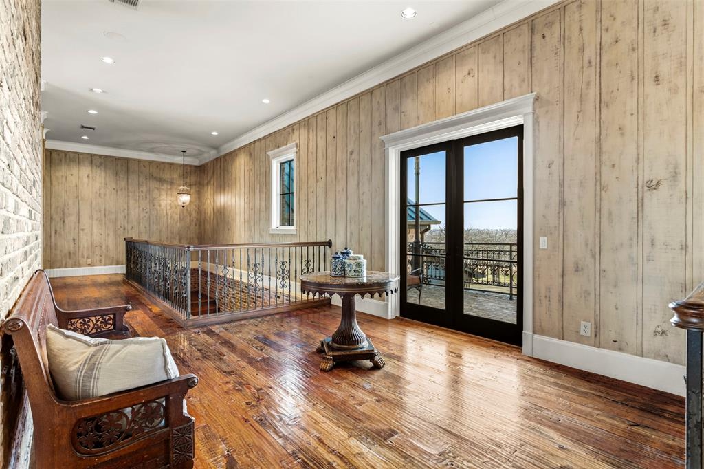 1096 Roadrunner Road Bartonville, TX 76226 - Photo 24 of 40 Upstairs landing with private balcony at front of home