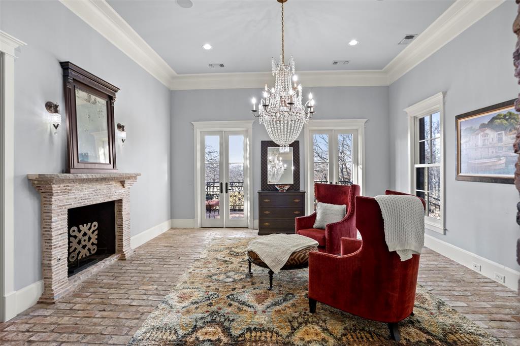 1096 Roadrunner Road Bartonville, TX 76226 - Photo 9 of 40 Parlor/sitting room off foyer with french doors to covered patio on front side of home.