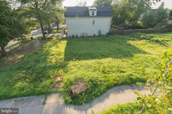 a view of a backyard of the house