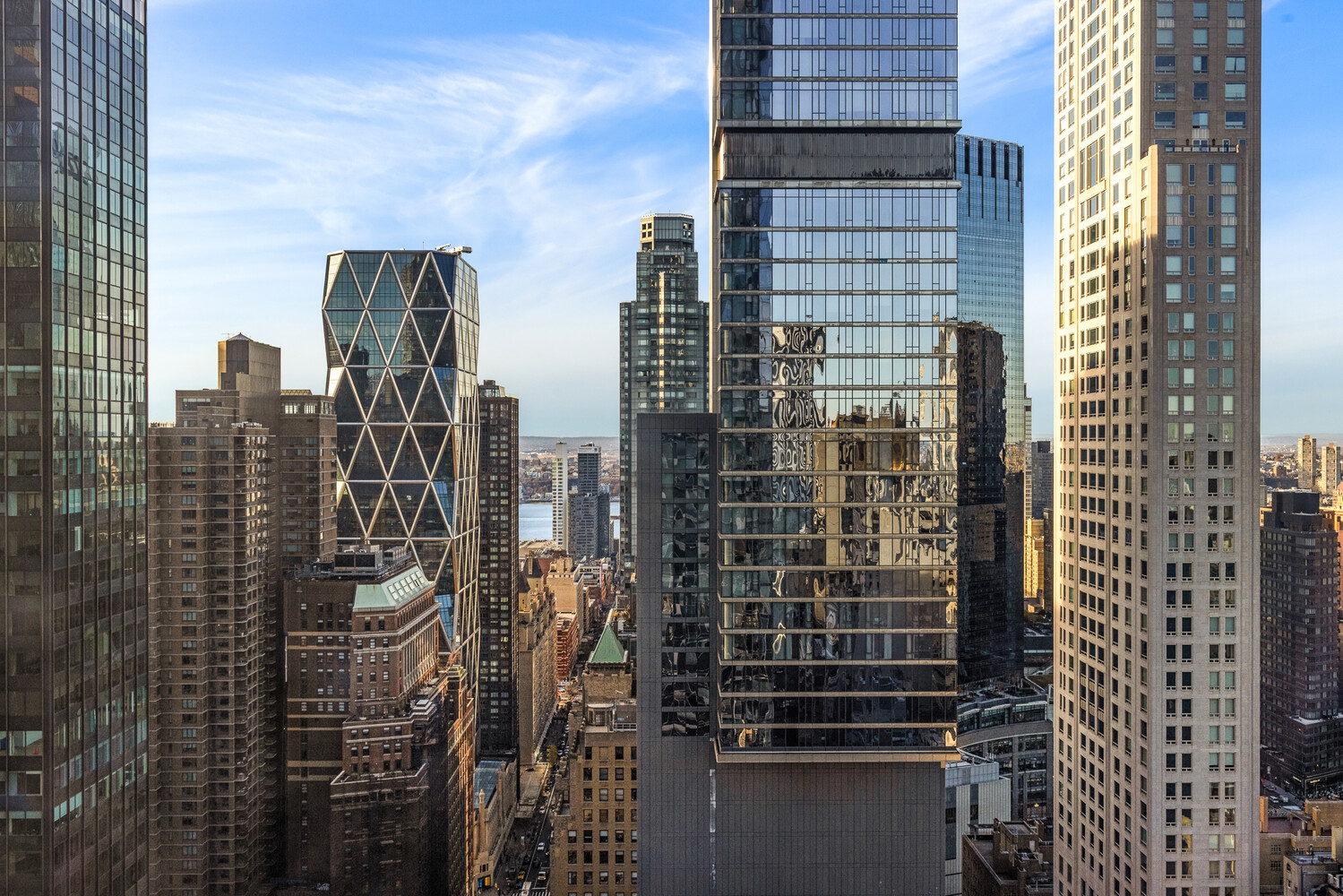 157 West 57th Street, Unit 43B Manhattan, NY 10019 - Photo 3 of 10 a view of a city with tall buildings