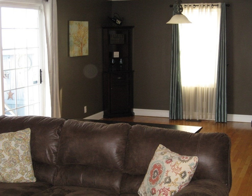 95 Grandview Street Springfield, MA 01118 - Photo 11 of 30 a bed sitting in a bedroom next to a window