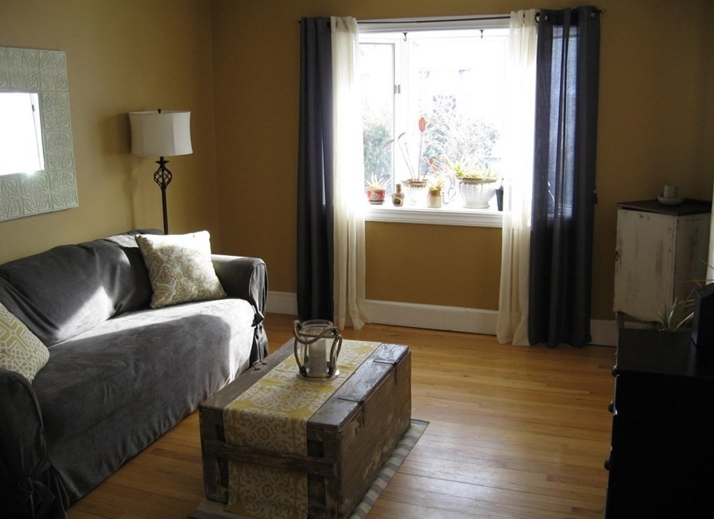 95 Grandview Street Springfield, MA 01118 - Photo 13 of 30 a living room with furniture and a window