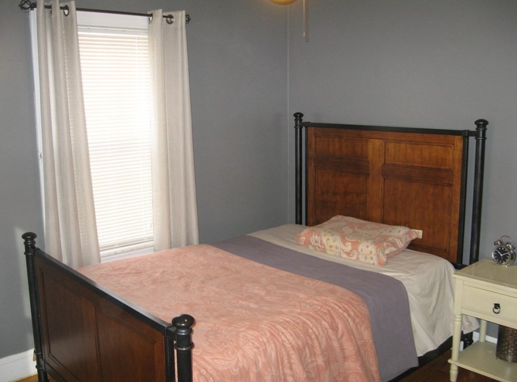 95 Grandview Street Springfield, MA 01118 - Photo 16 of 30 a bedroom with a bed and a window