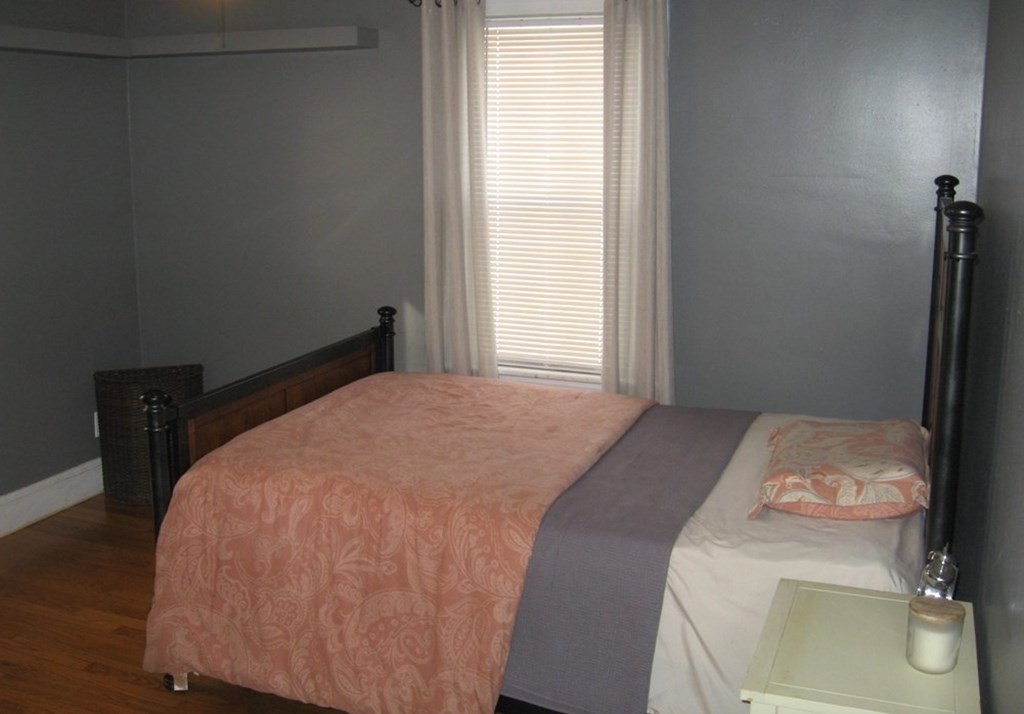 95 Grandview Street Springfield, MA 01118 - Photo 17 of 30 a bedroom with a bed and a window