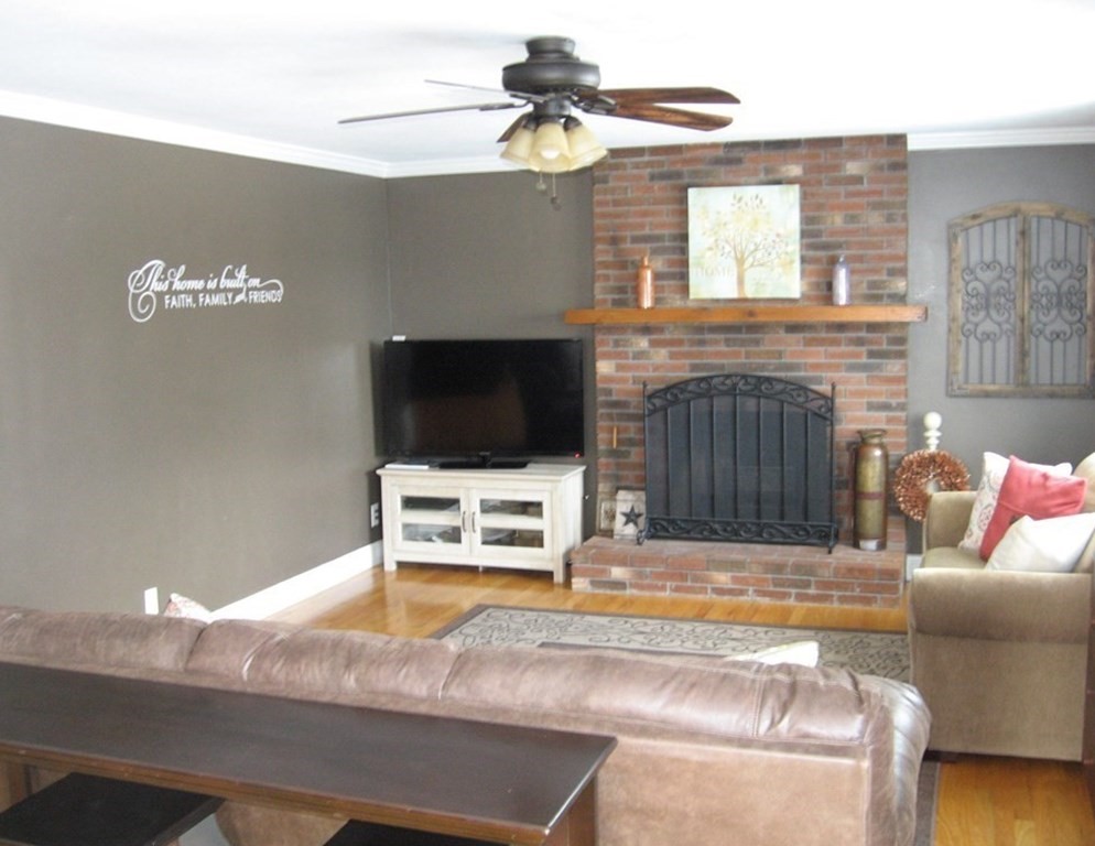 95 Grandview Street Springfield, MA 01118 - Photo 2 of 30 a living room with furniture and a flat screen tv
