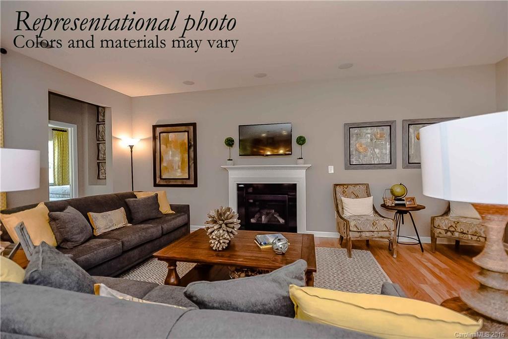 79175 Ridgehaven Road, Unit 151 Lancaster, SC 29720 - Photo 12 of 20 a living room with furniture and a fireplace