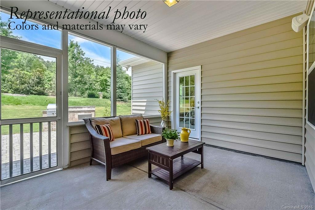 79175 Ridgehaven Road, Unit 151 Lancaster, SC 29720 - Photo 19 of 20 a outdoor living space with furniture and garden view