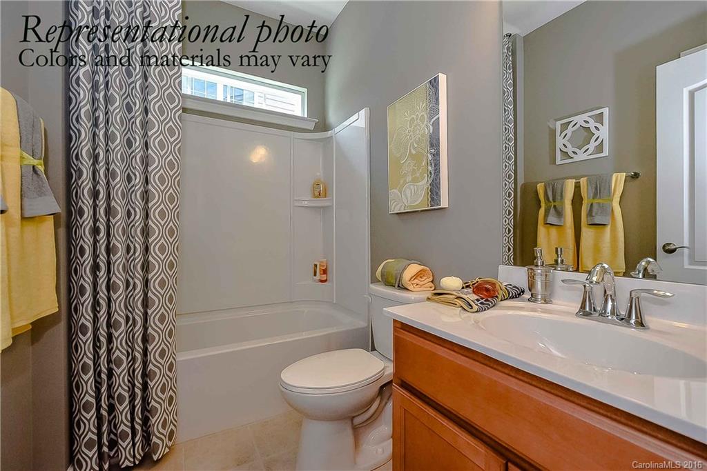 79175 Ridgehaven Road, Unit 151 Lancaster, SC 29720 - Photo 3 of 20 a bathroom with a sink toilet and shower