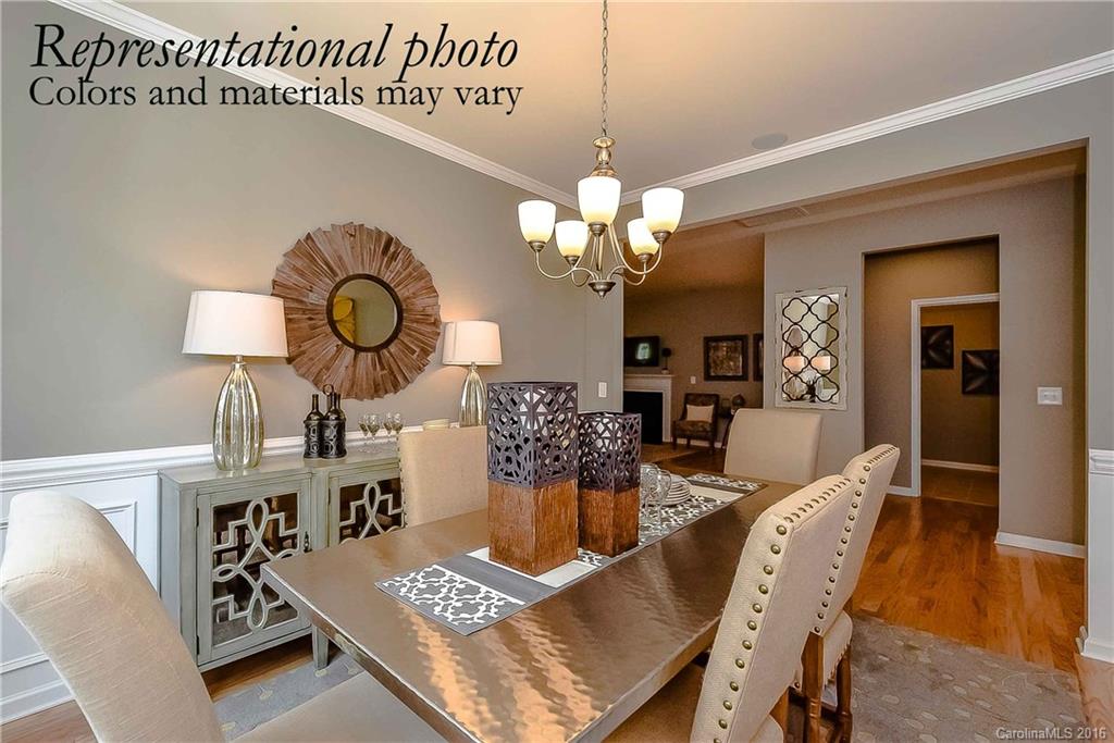 79175 Ridgehaven Road, Unit 151 Lancaster, SC 29720 - Photo 5 of 20 a view of a dining room with furniture and wooden floor