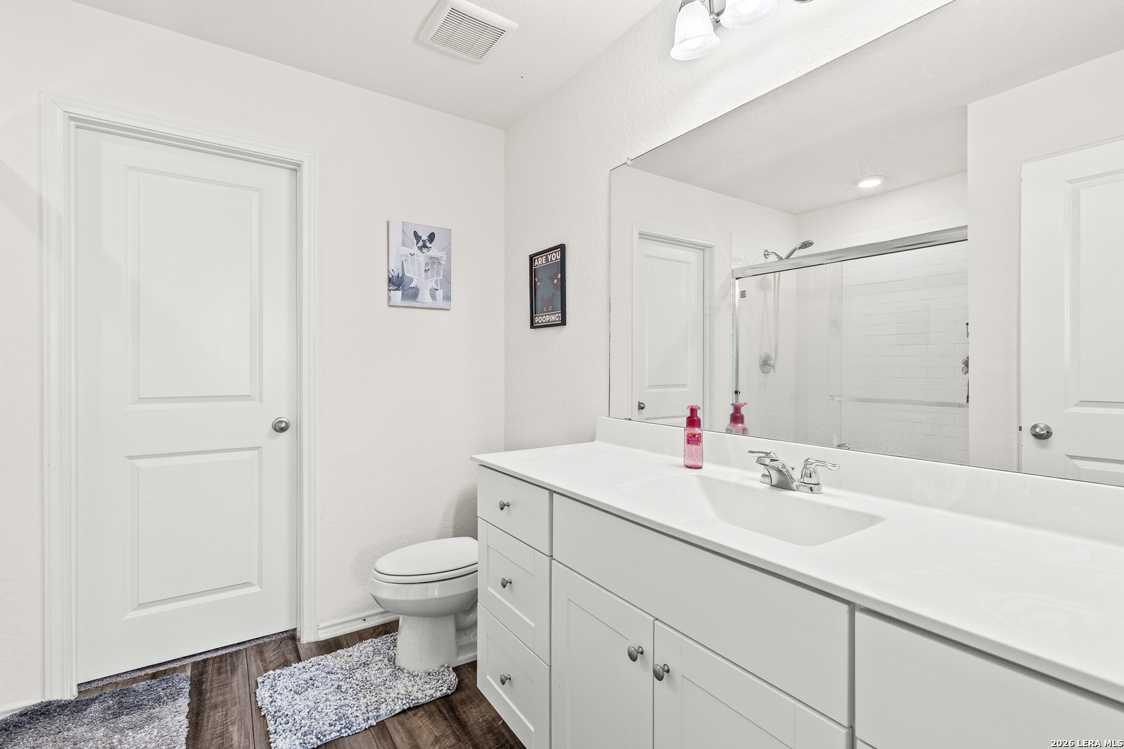 5802 Rue Picasso Converse, TX 78109 - Photo 16 of 23 a bathroom with a sink a toilet and shower