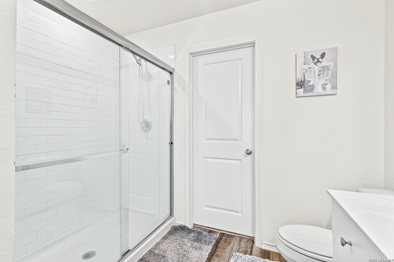 5802 Rue Picasso Converse, TX 78109 - Photo 17 of 23 a bathroom with a shower and a toilet