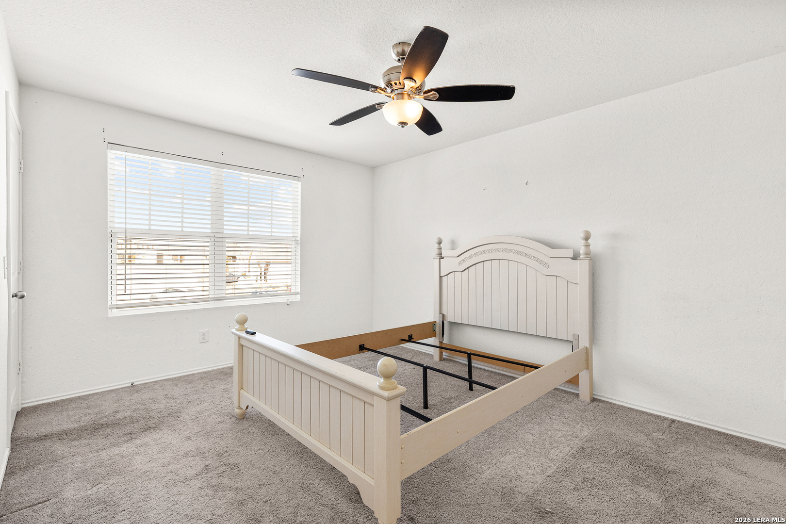 5802 Rue Picasso Converse, TX 78109 - Photo 19 of 23 a living room with a window