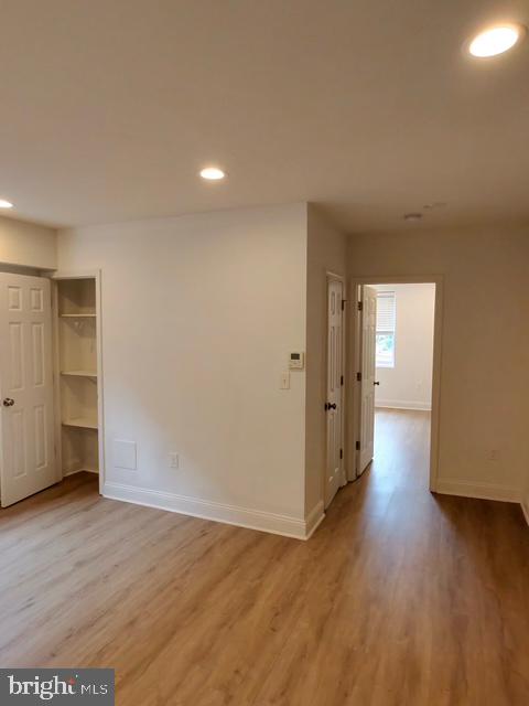 317 Decatur Street Northwest, Unit 4 Washington, DC 20011 - Photo 18 of 19 a view of a room with wooden floor and window