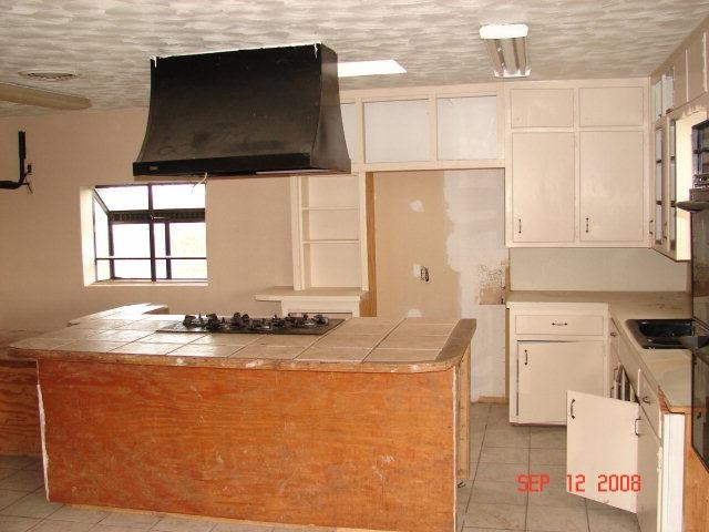 0 Us Highway, Unit TRACT 13 Ralls, TX 79357 - Photo 3 of 8 a kitchen with stainless steel appliances granite countertop a sink and a stove