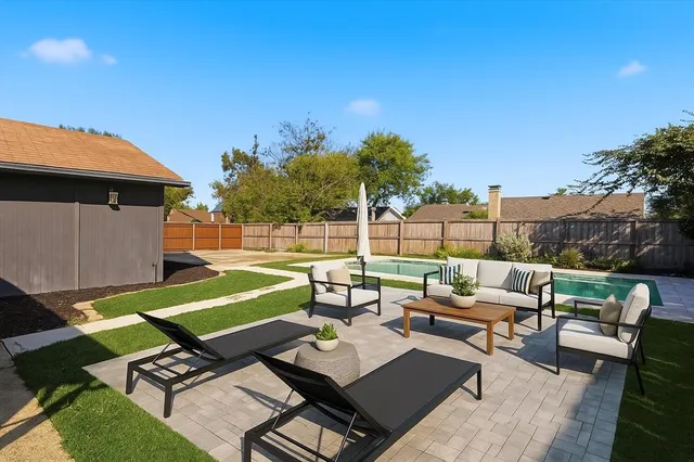 a view of a terrace with furniture