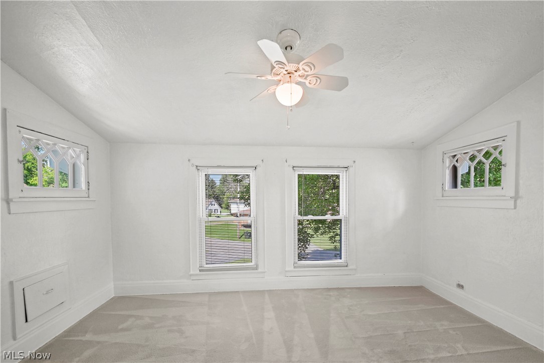 503 Ravenna Road Newton Falls, OH 44444 - Photo 18 of 34 Light gray wall-to-wall carpeting complements the white textured walls and ceiling