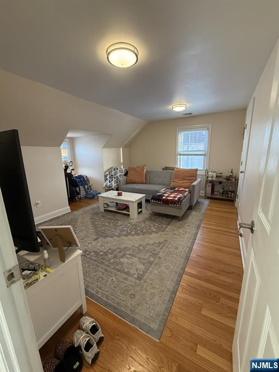 337 2nd Street Saddle Brook, NJ 07663 - Photo 5 of 9 a living room with furniture and a flat screen tv