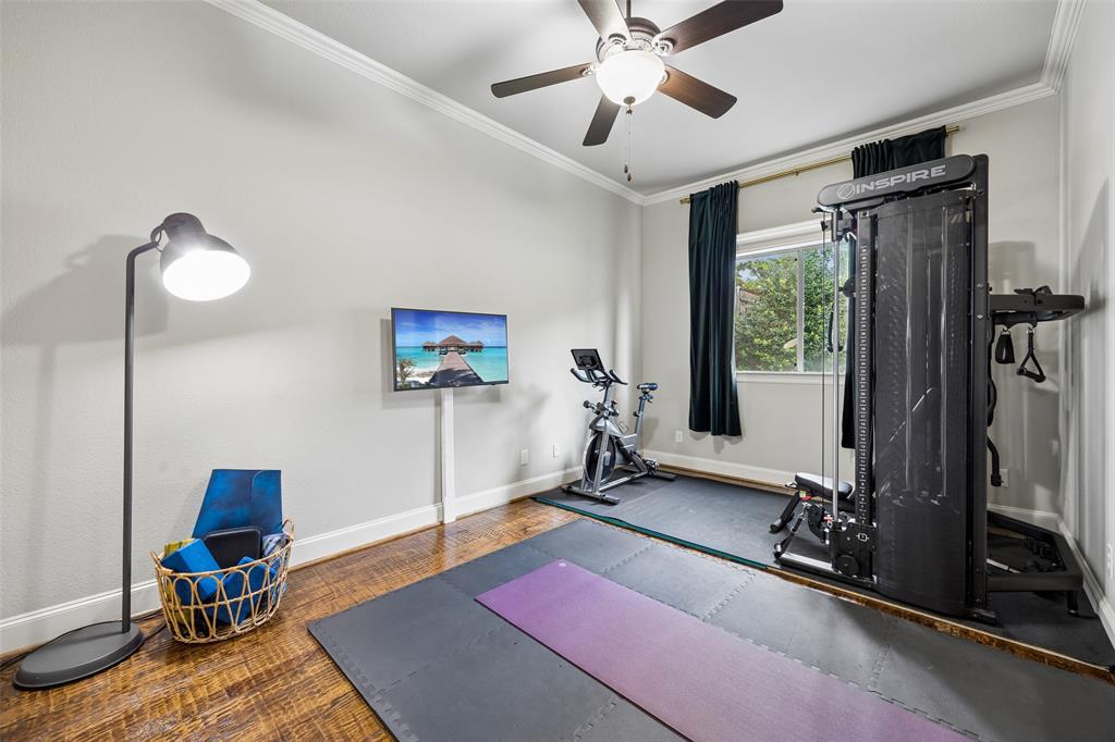 1608 Tuscan Ridge Circle Southlake, TX 76092 - Photo 20 of 36 a room with gym equipment and a large window