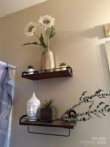 a vase of flowers sitting on a table