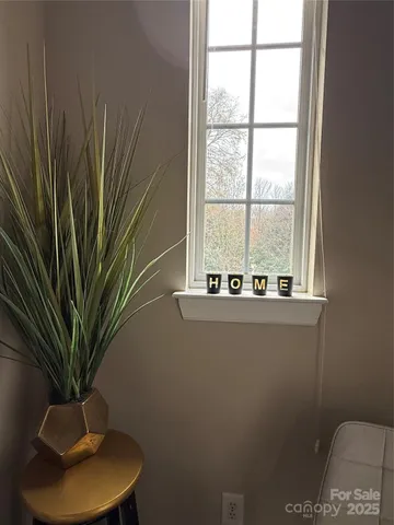 a vase of flowers sitting on a table