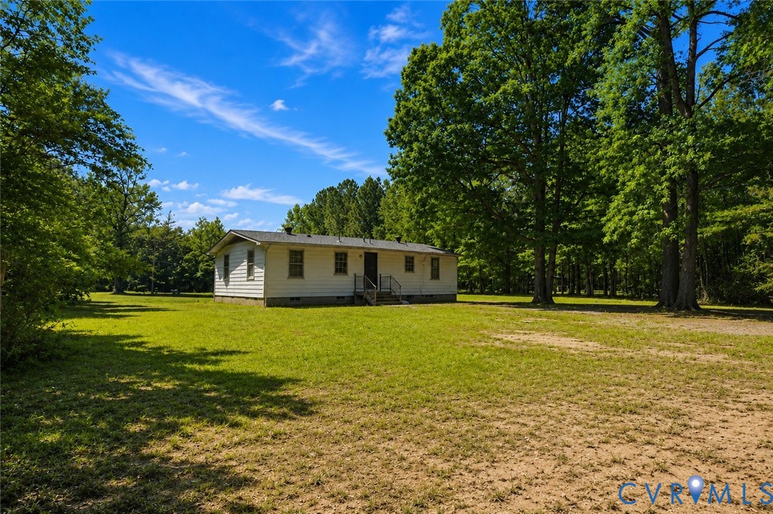 14527 Arwood Road Disputanta, VA 23842 - Photo 20 of 20 a front view of a house with a yard