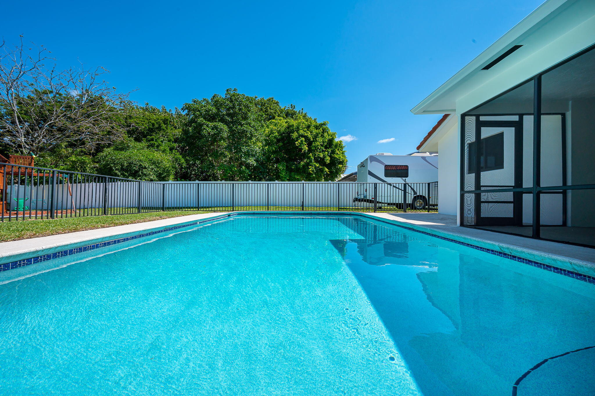 1151 Northwest 6th Avenue Boca Raton, FL 33432 - Photo 22 of 42 a view of swimming pool with a yard