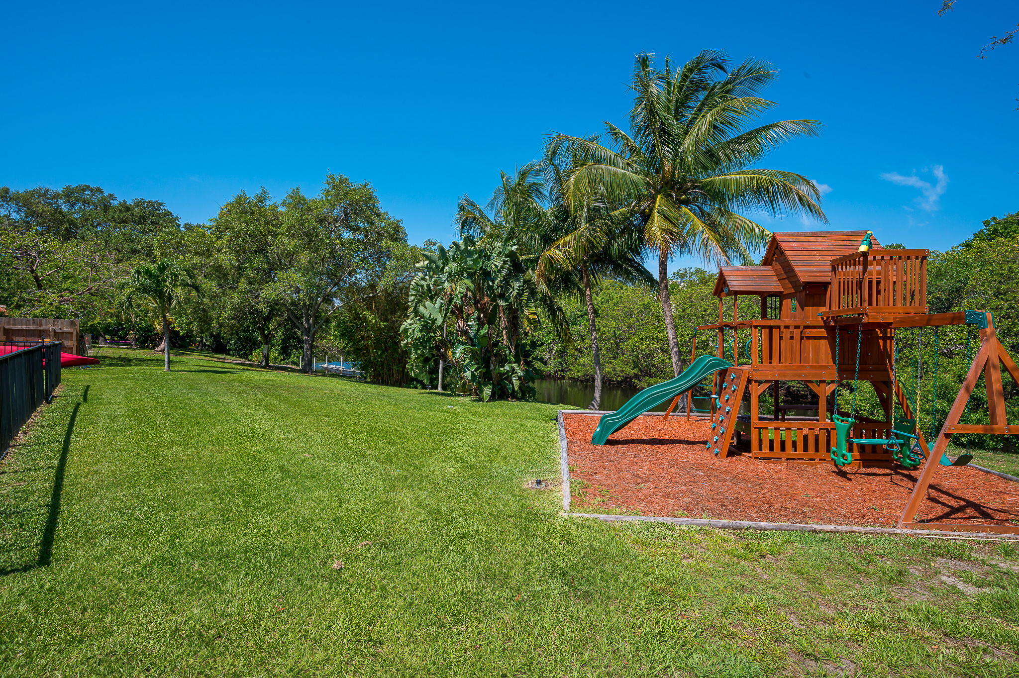 1151 Northwest 6th Avenue Boca Raton, FL 33432 - Photo 23 of 42 a view of a house with a yard