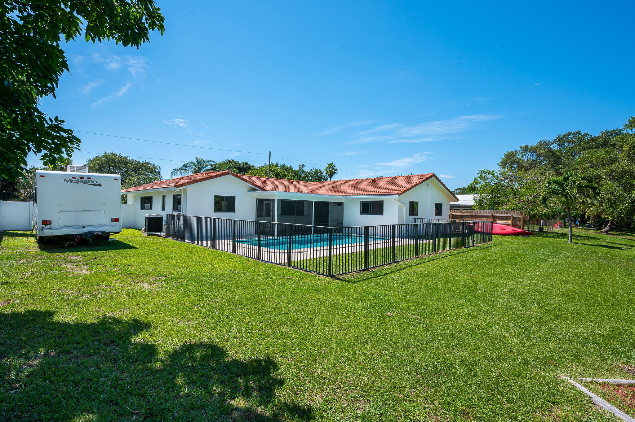 1151 Northwest 6th Avenue Boca Raton, FL 33432 - Photo 24 of 42 a view of an house with a big yard