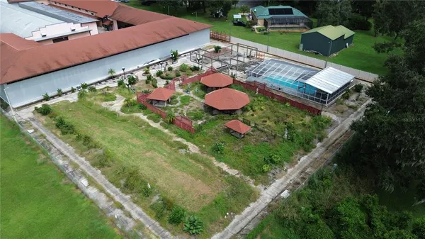 an aerial view of a house with a garden