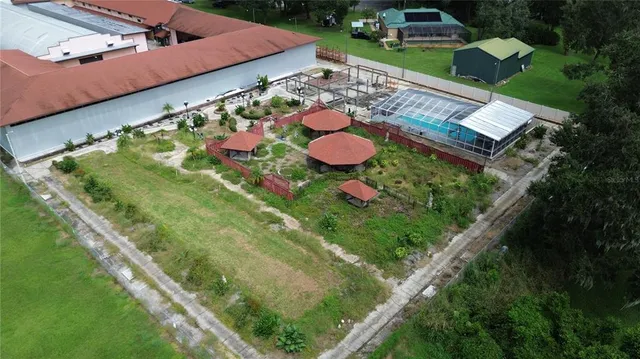 an aerial view of a house with a garden