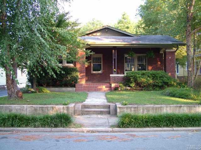 303 Duncan Street Raleigh, NC 27608 - Photo 1 of 1 a front view of a house with a yard