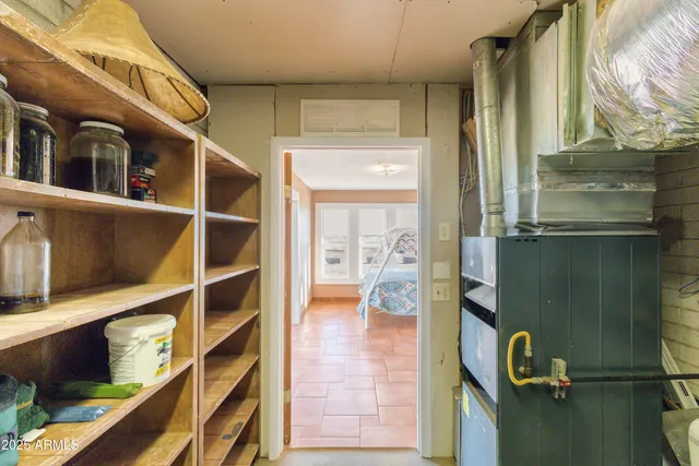 a view of a house with a yard and garage