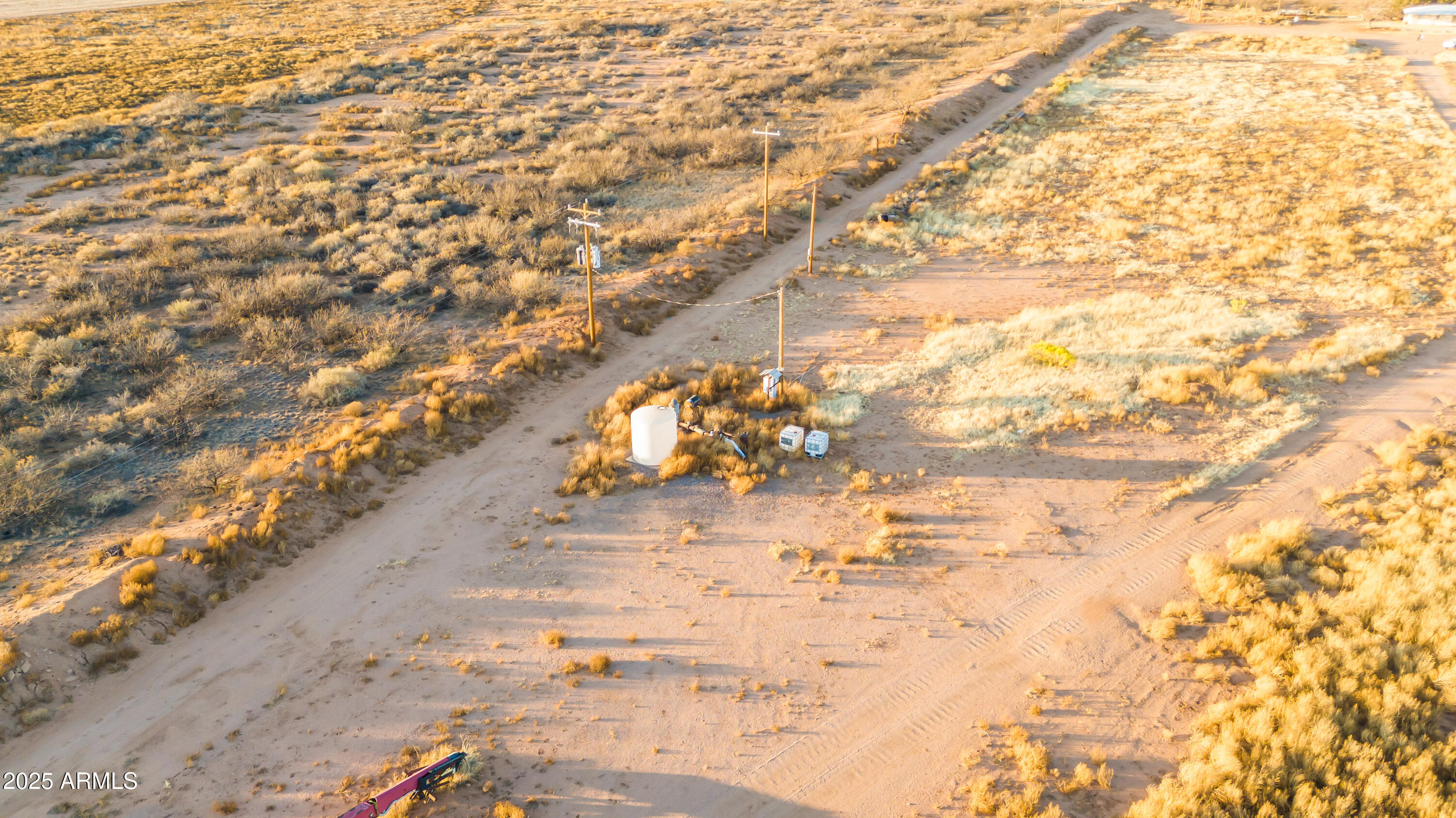4842 West Gleeson Road Elfrida, AZ 85610 - Photo 7 of 51 a view of a dry yard with lots of trees