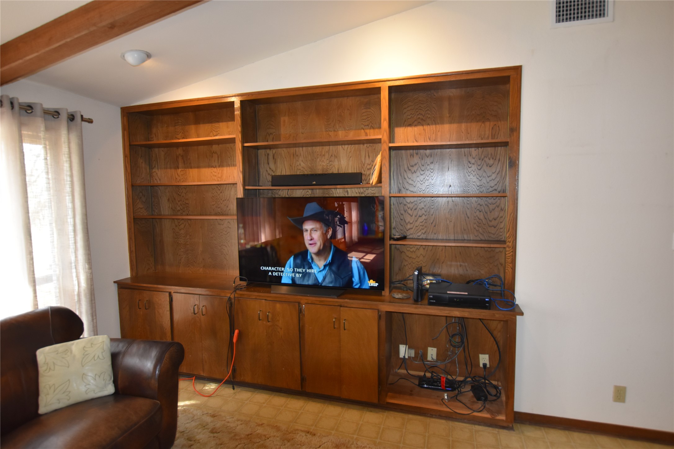 687 Fm 812 Road Red Rock, TX 78662 - Photo 12 of 40 Living area with light flooring and lofted ceiling